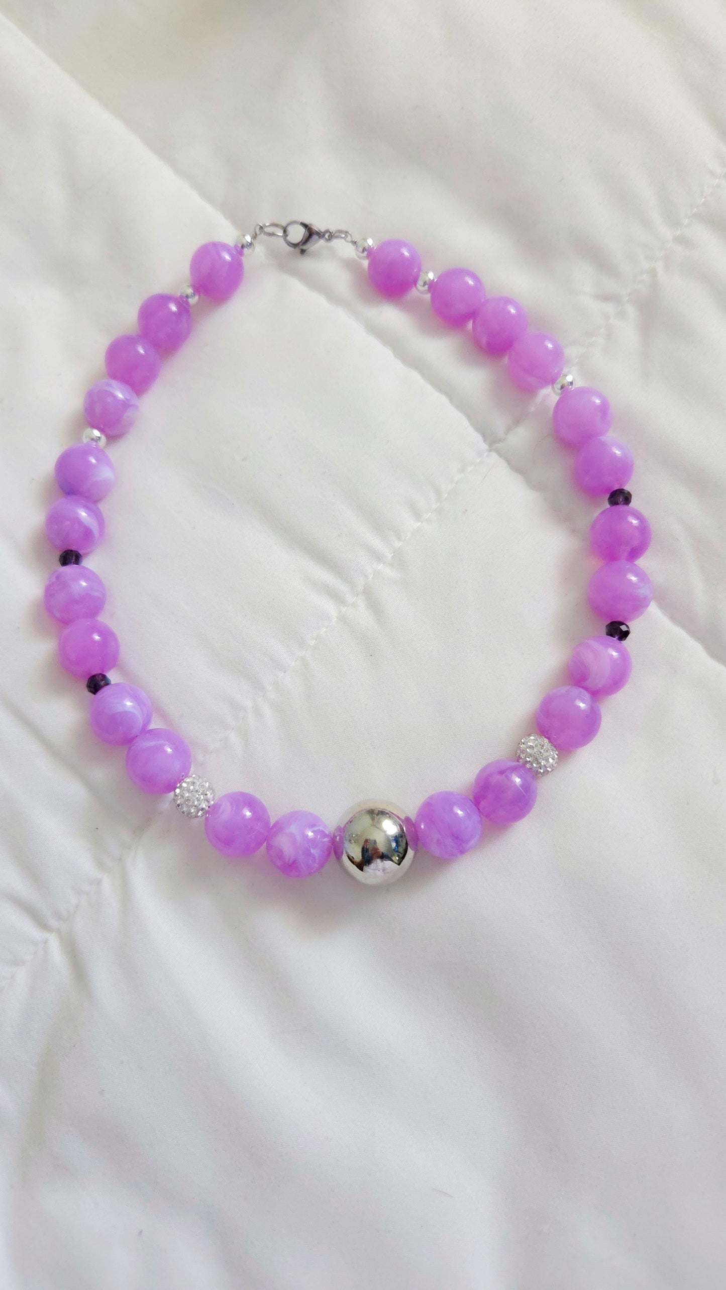 Chunky lilac choker necklace with 18mm acrylic beads, rhinestone crystal accents, and hematite details โ bold dopamine dressing jewelry by Lalabel.