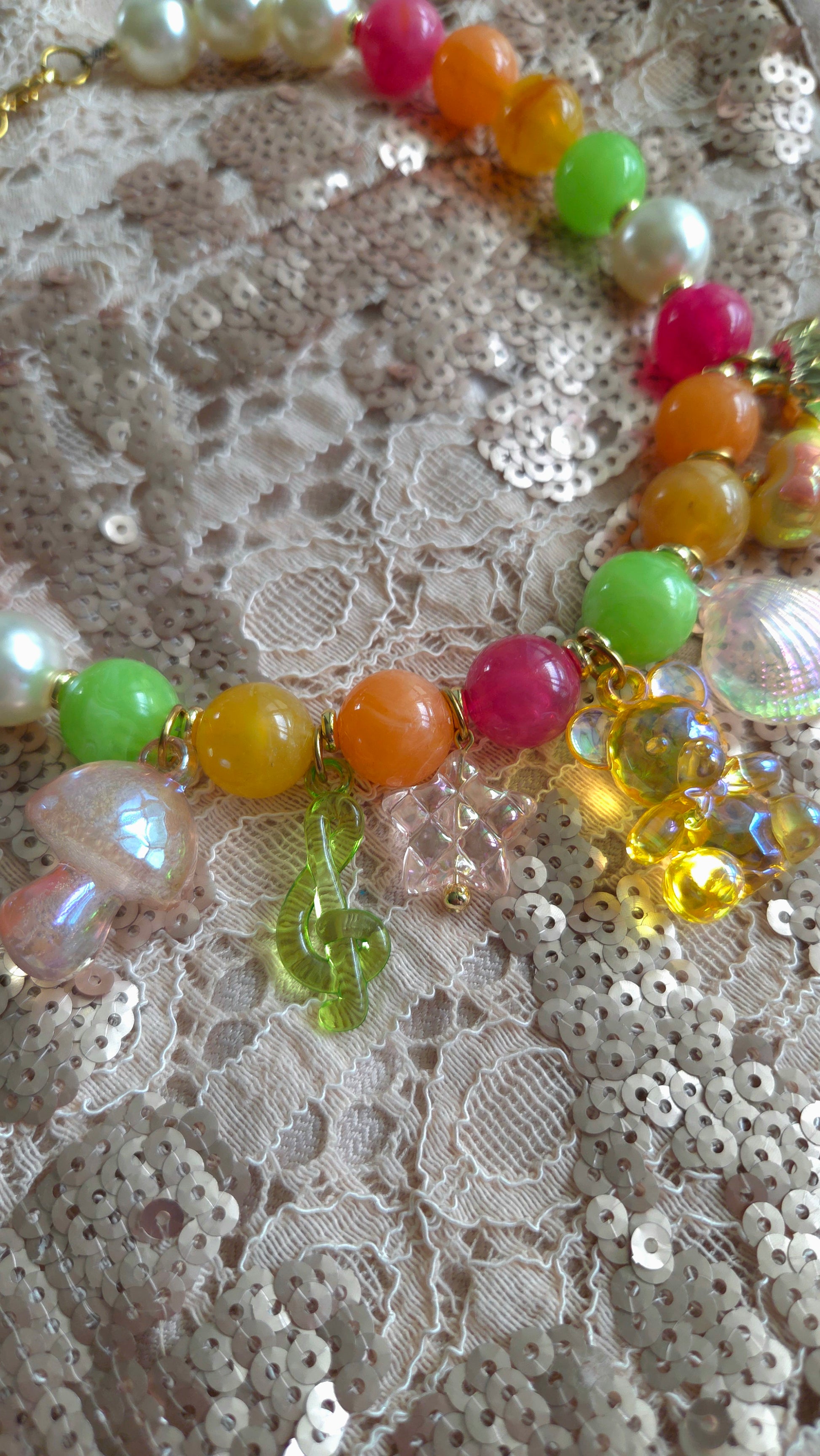 Tropical candy necklace

Colorful statement necklace

Chunky pearls jewelry

Fruit charm necklace

Y2K dopamine dressing

Handmade playful jewelry

Acrylic charms necklace

Strawberry charm necklace

Vibrant dopamine-core

Bold colorful fashion